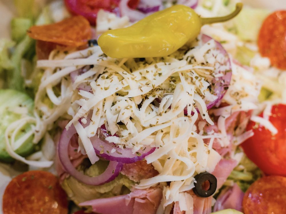 Antipasto salad with ham, pepperoni, cheese and pepperoncini
