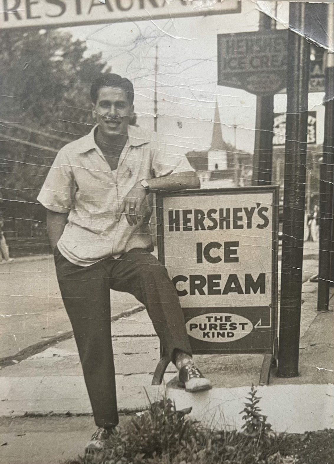 Fred Kirshy standing outside Queenie's Italian Restaurant in Brooklyn, New York